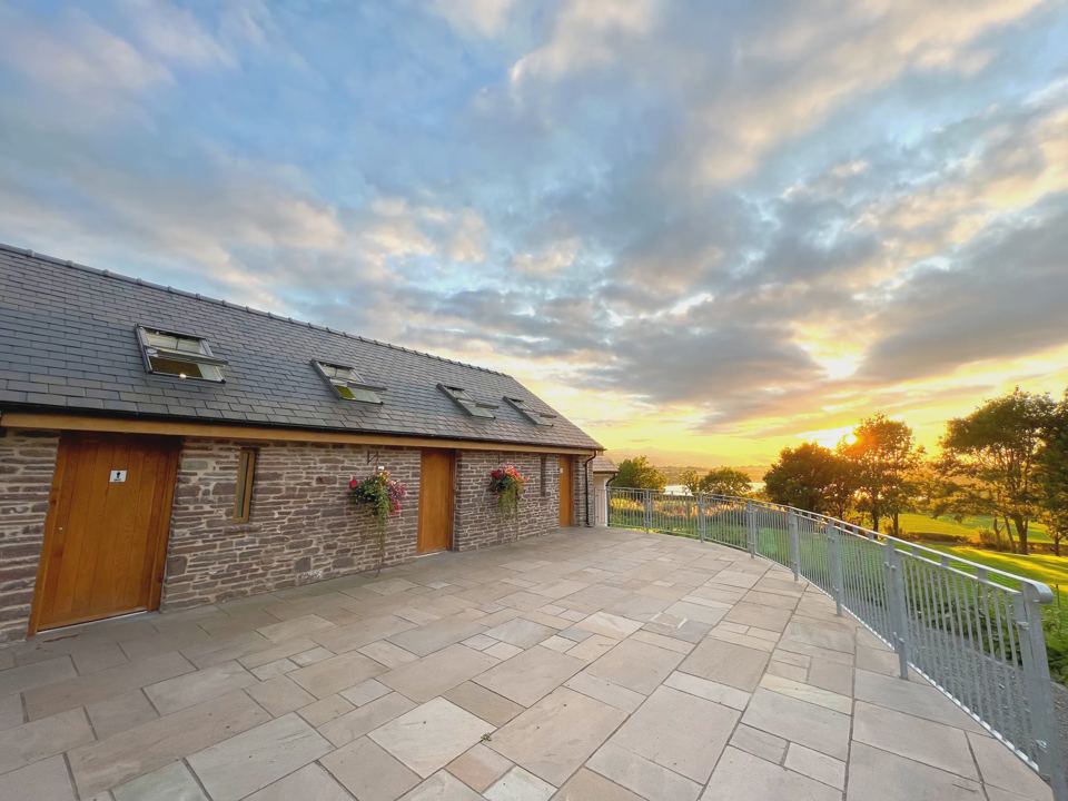 Facilities building at sunset