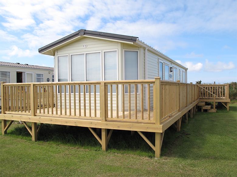 Static caravan with decking