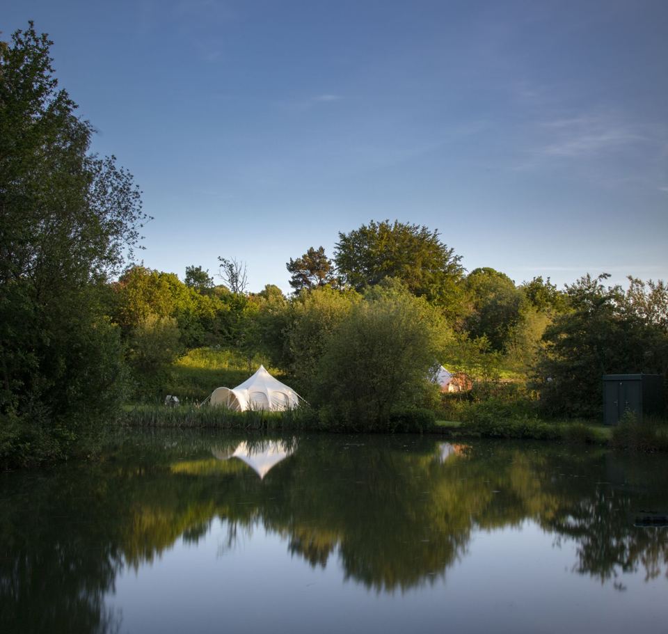Tent reflected in the lake