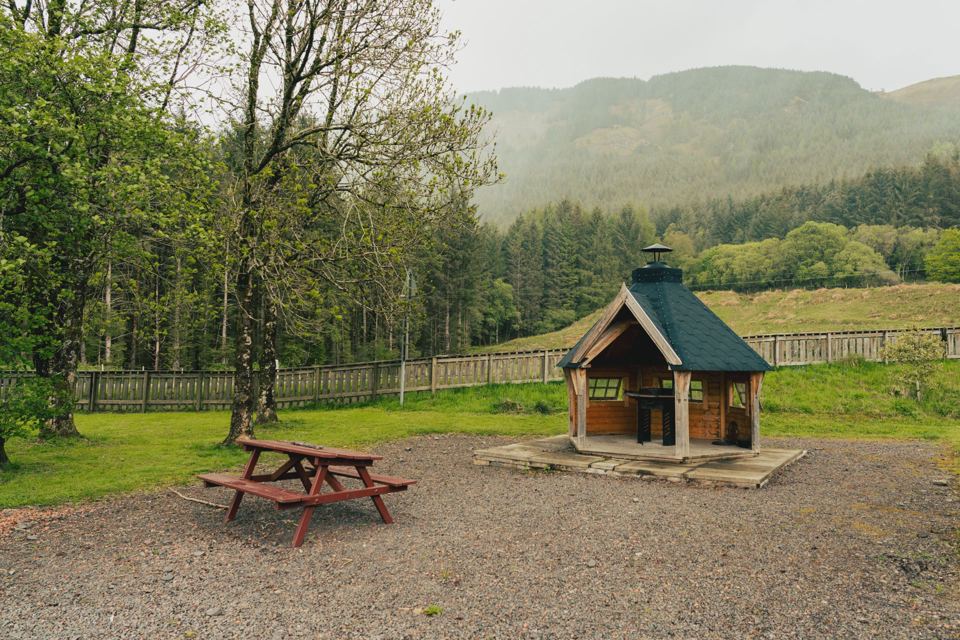 Barbecue hut and picnic table