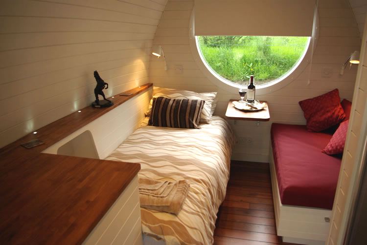 Inside a pod, bed made up