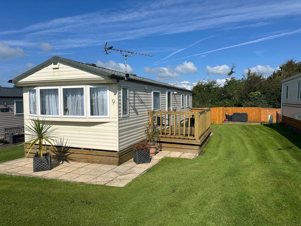 Static caravan with decking
