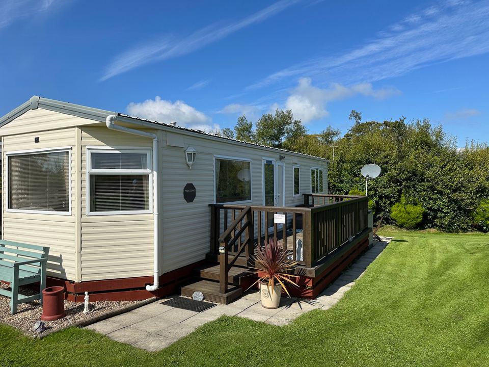 Static caravan and lawn