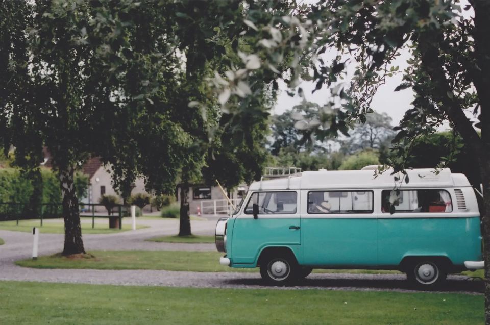 Campervan under the trees