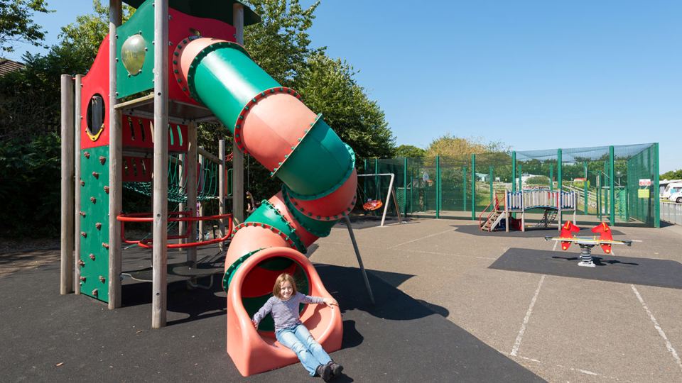 Play area with slide