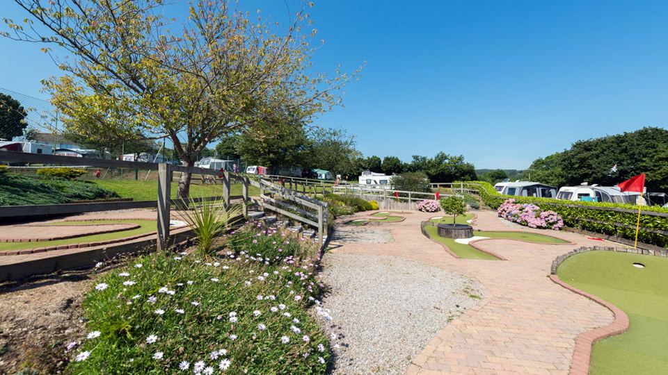 Mini golf beside the flower beds
