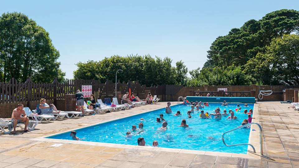 Outdoor pool with swimmers