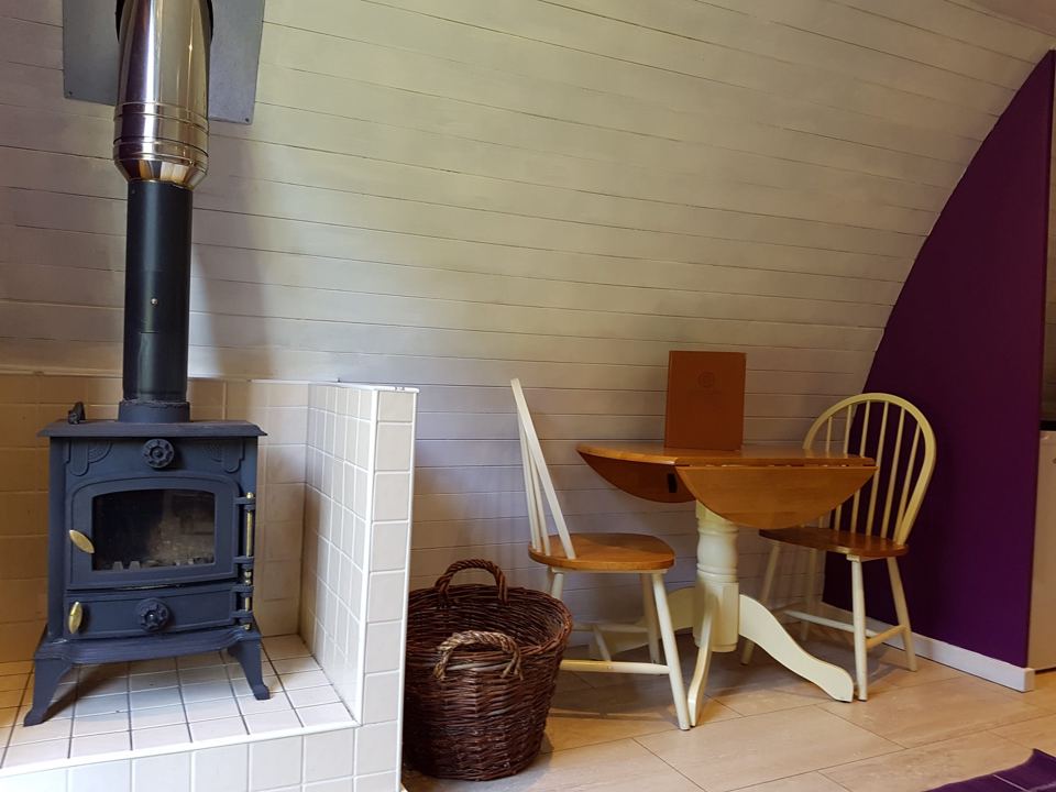 Wood-burner inside a pod