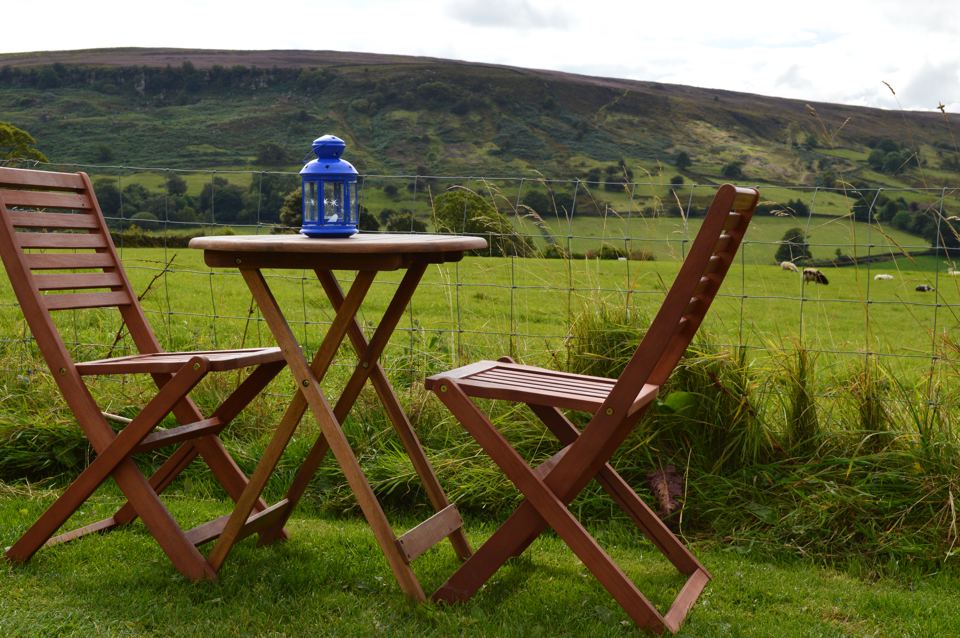 Table and chairs with a view