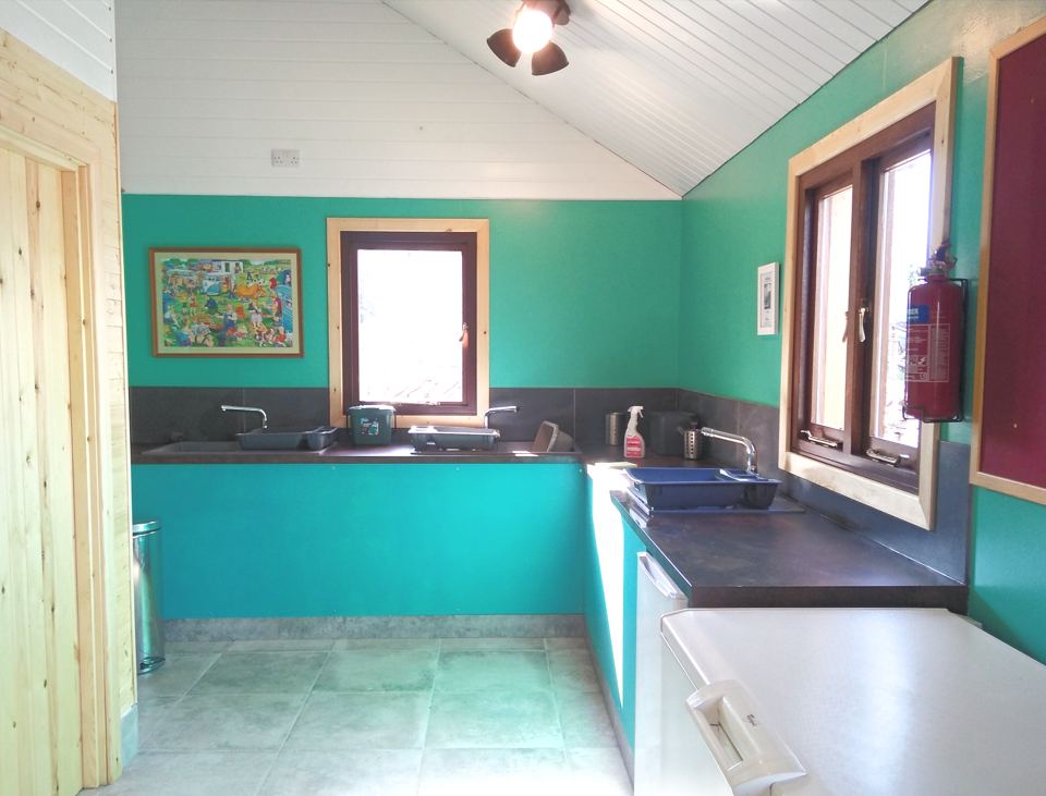 Kitchen area in teal