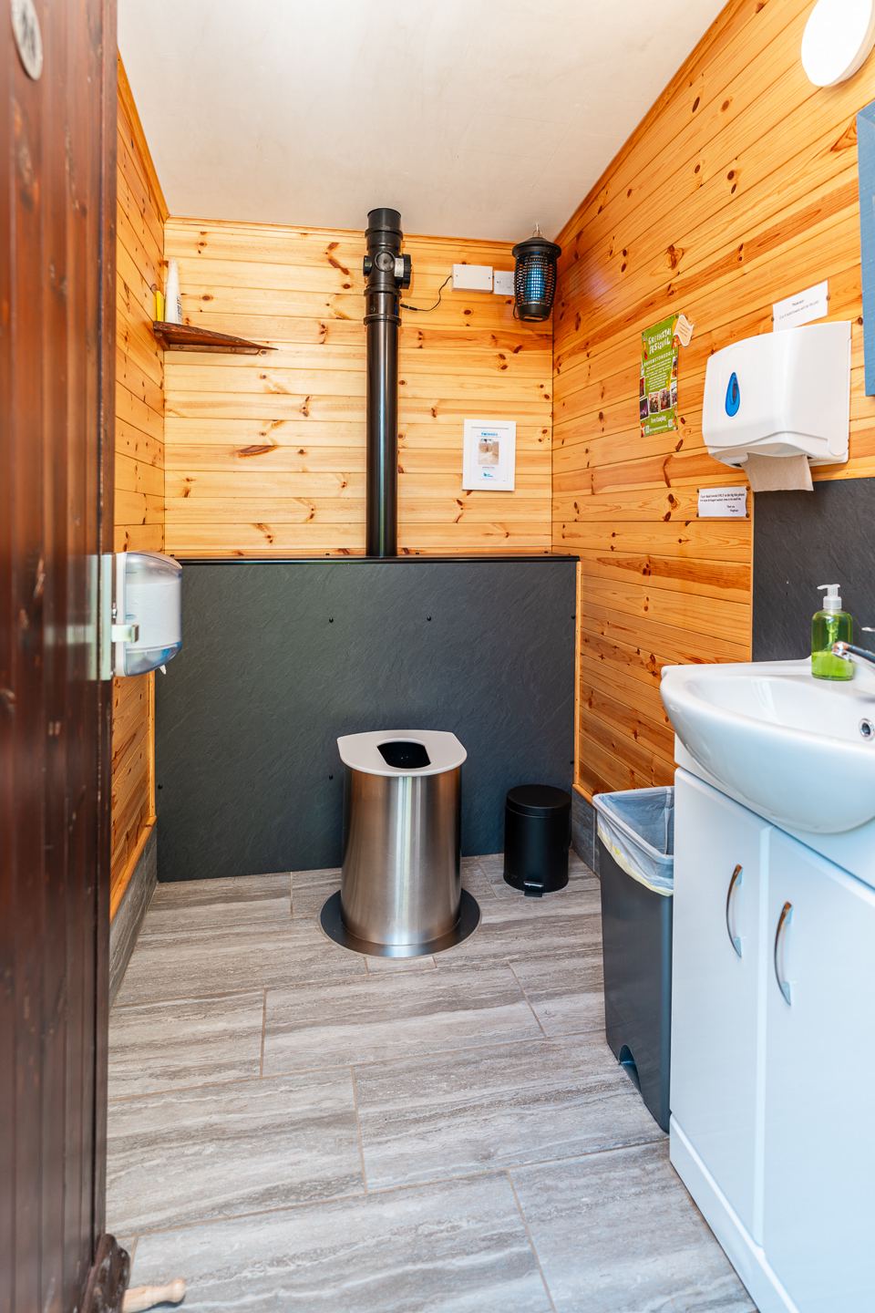 Wooden washroom with sink