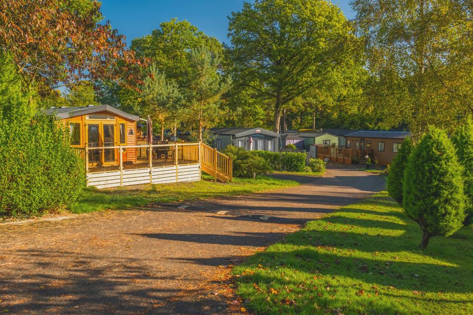 Lodge with decking on the gravel