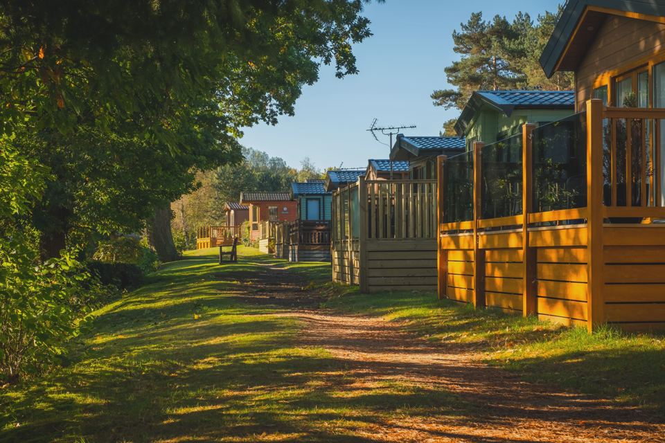 Lodges along the grass path