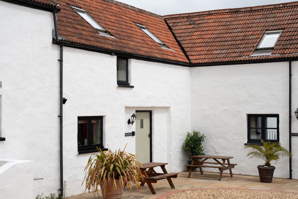 Whitewashed stone cottage