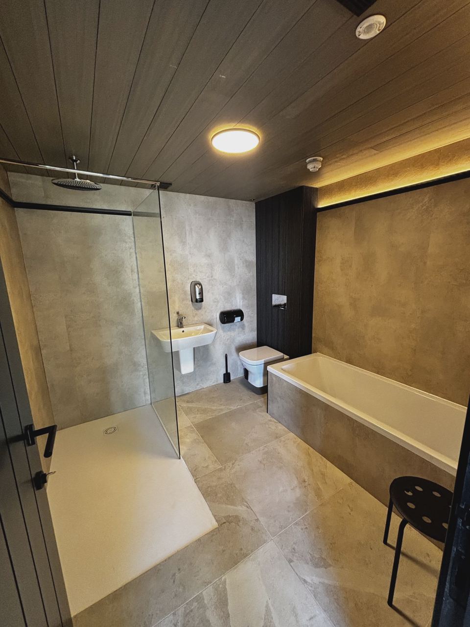 Bathroom with shower and bath