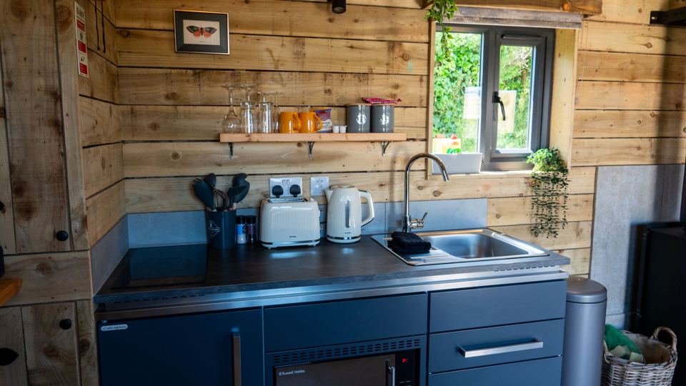 Kitchen inside the wooden cabin