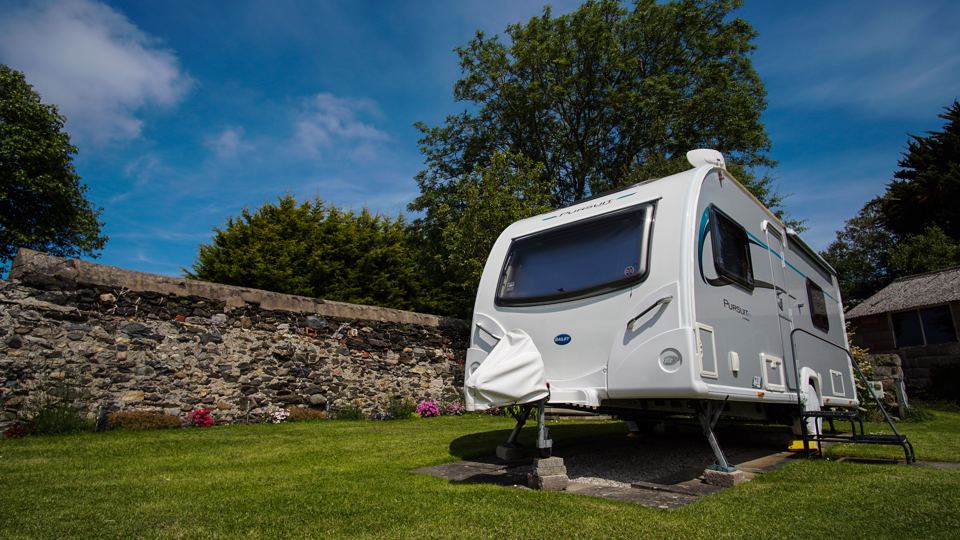 Touring caravan on grass
