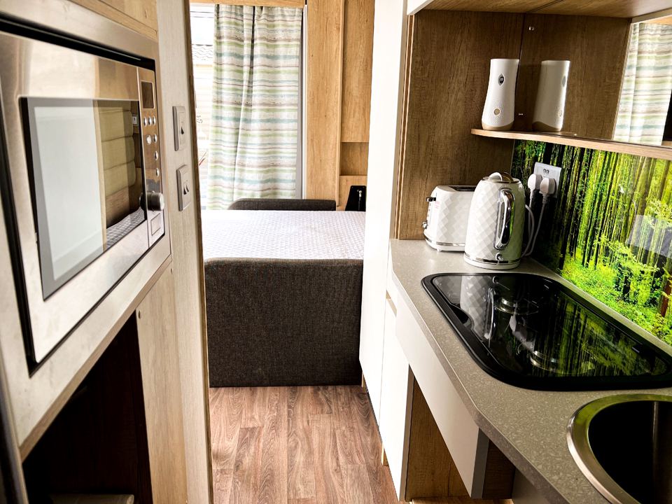 Kitchenette and bed
