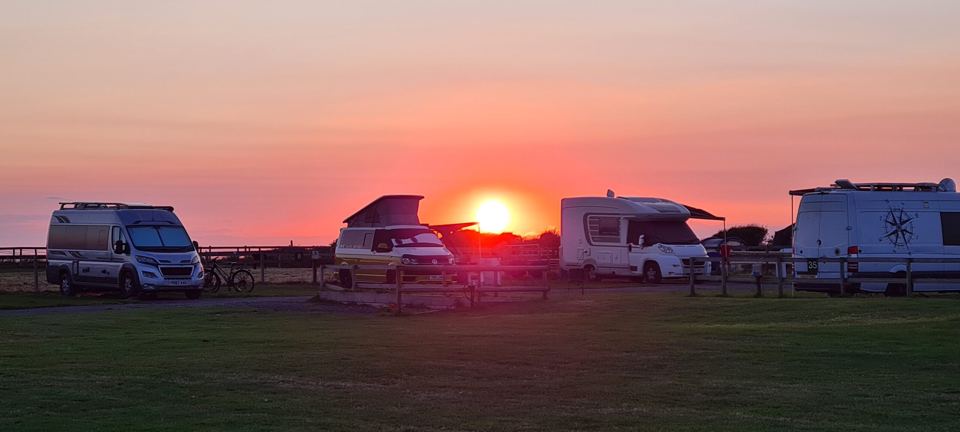 Motorhomes at sunset