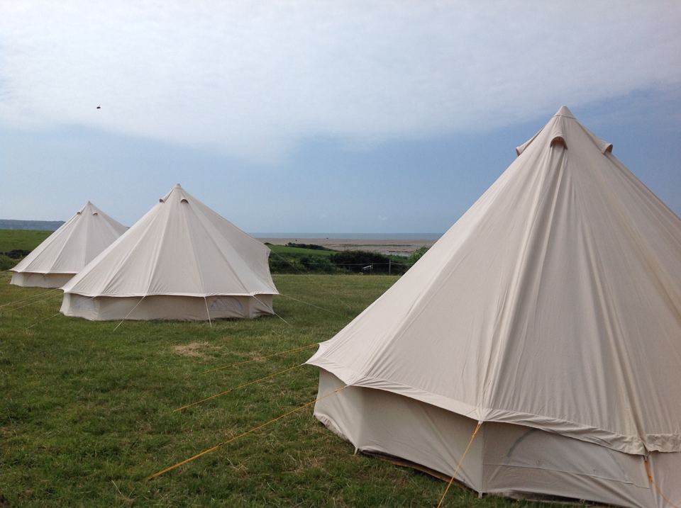 Bell tents in the field
