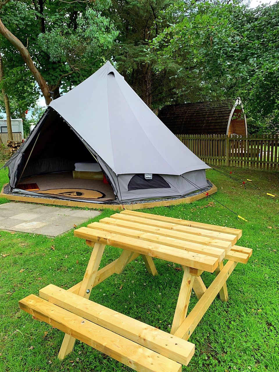 Bell tent and picnic bench