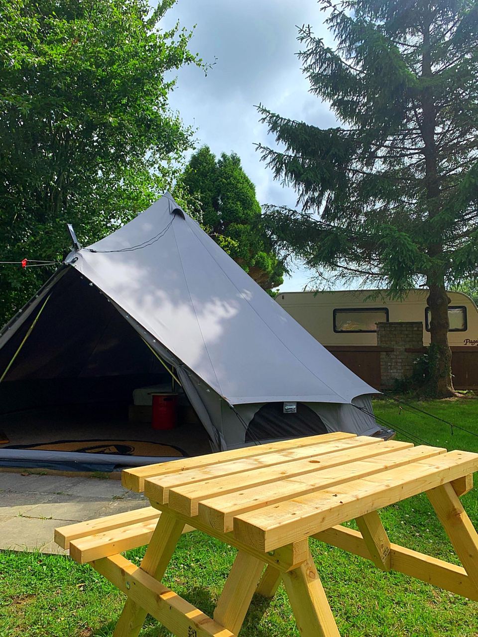 Bell tent with picnic bench
