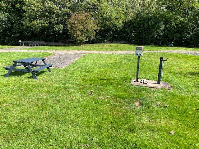 Pitch with picnic bench and tap