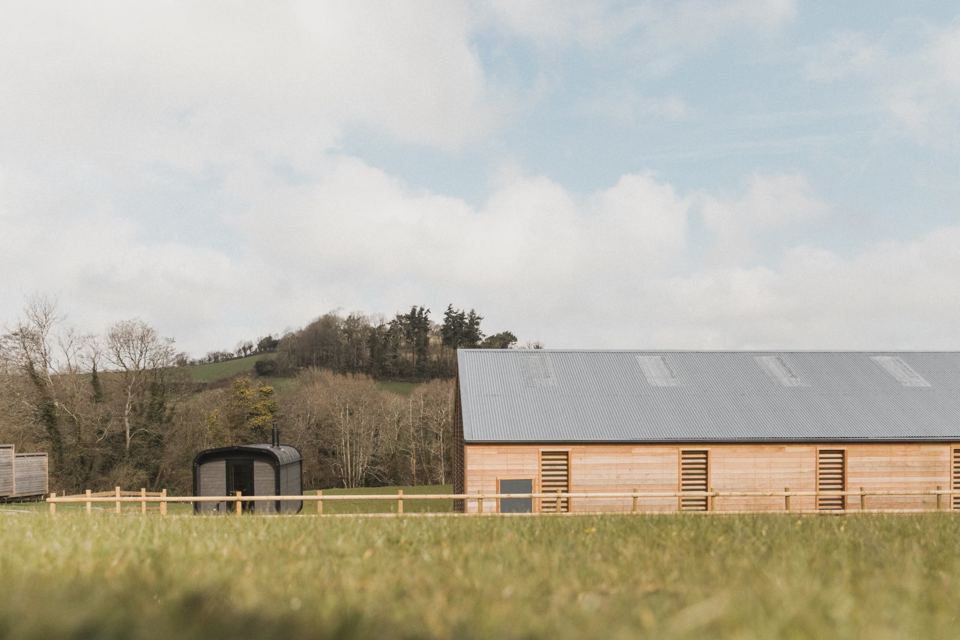 Barn in the field under cloud