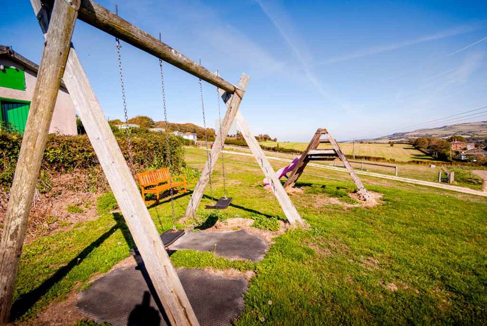 Swings on the hillside