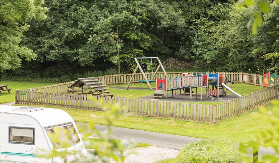 Play area beside the caravan pitches