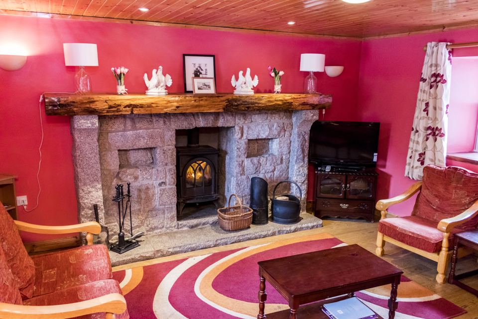 Hostel lounge with stove