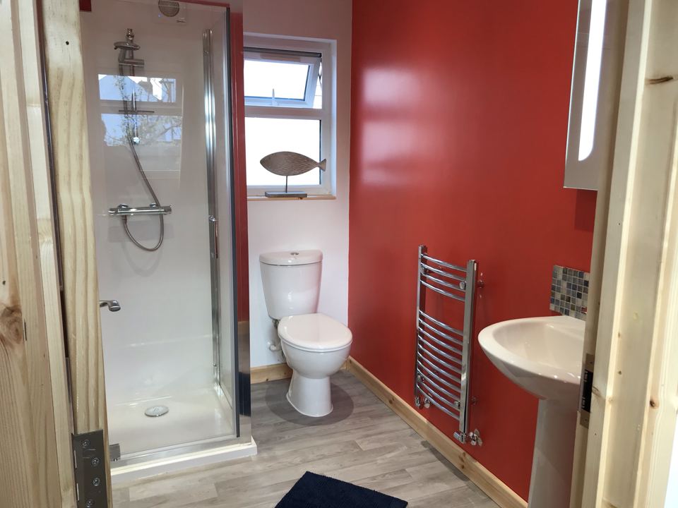 Shower room with red walls