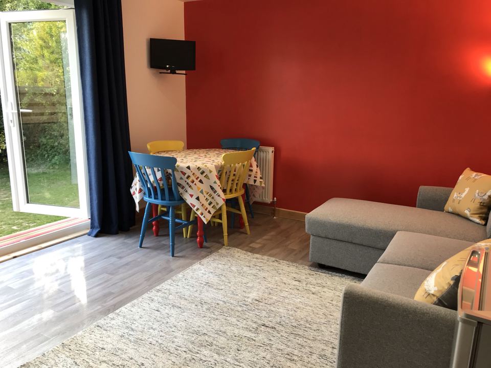 Cottage living room with red walls