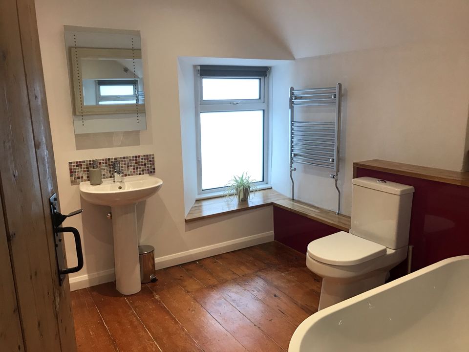 Bathroom with bath and basin