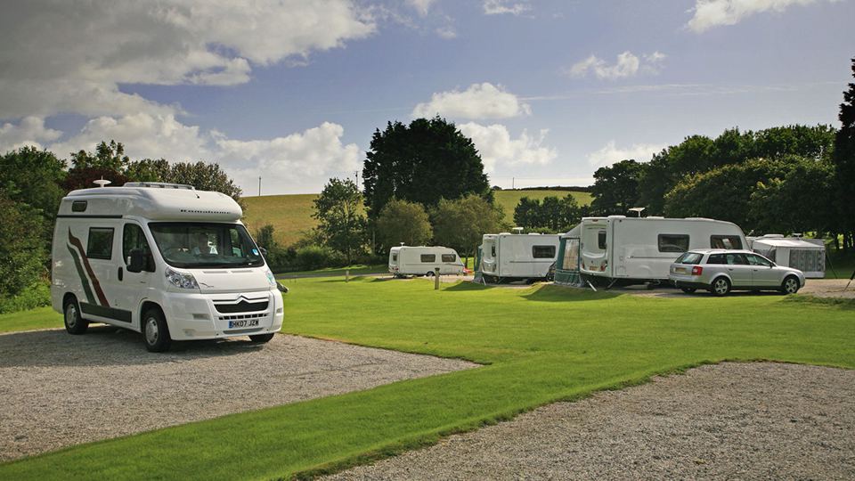 Motorhome and caravans on gravel pitches