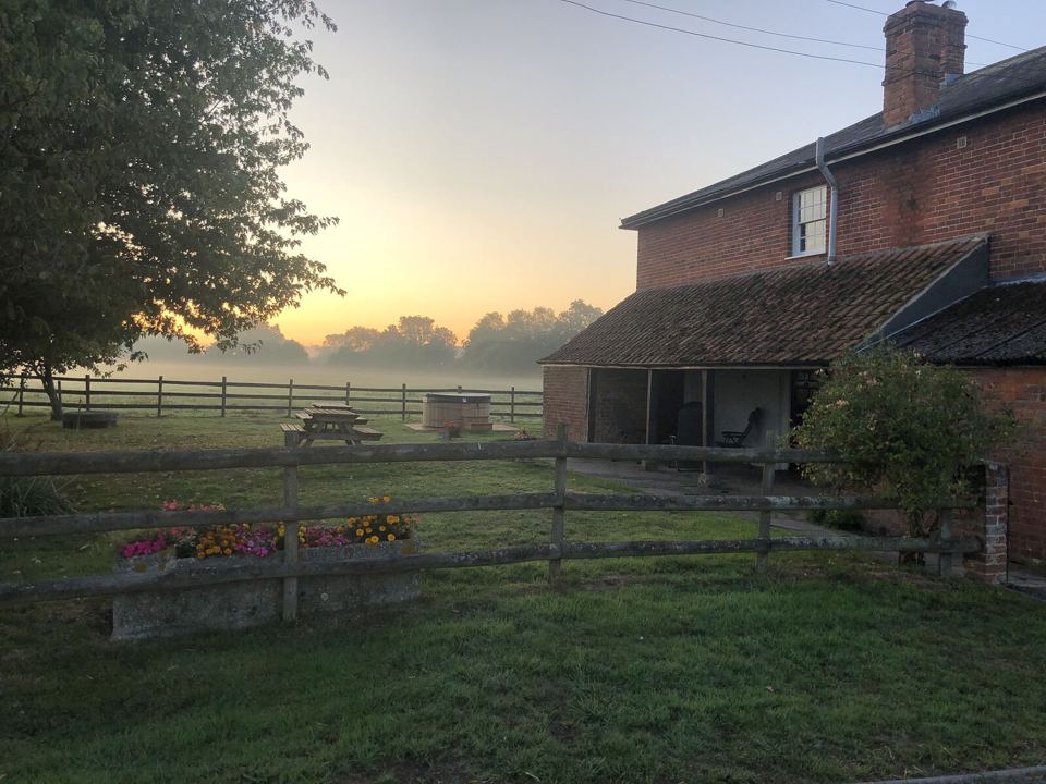 Farm buildings at dawn