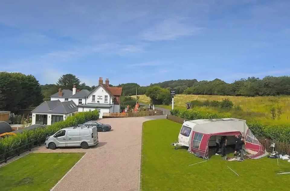 Caravan on the gravel by the house