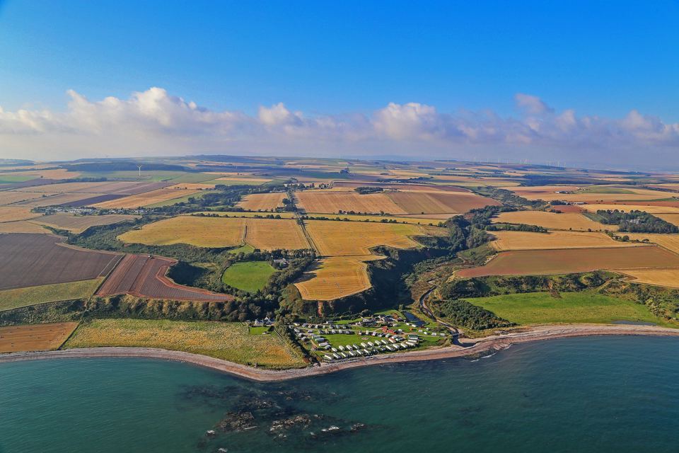 Park beside the shore from above