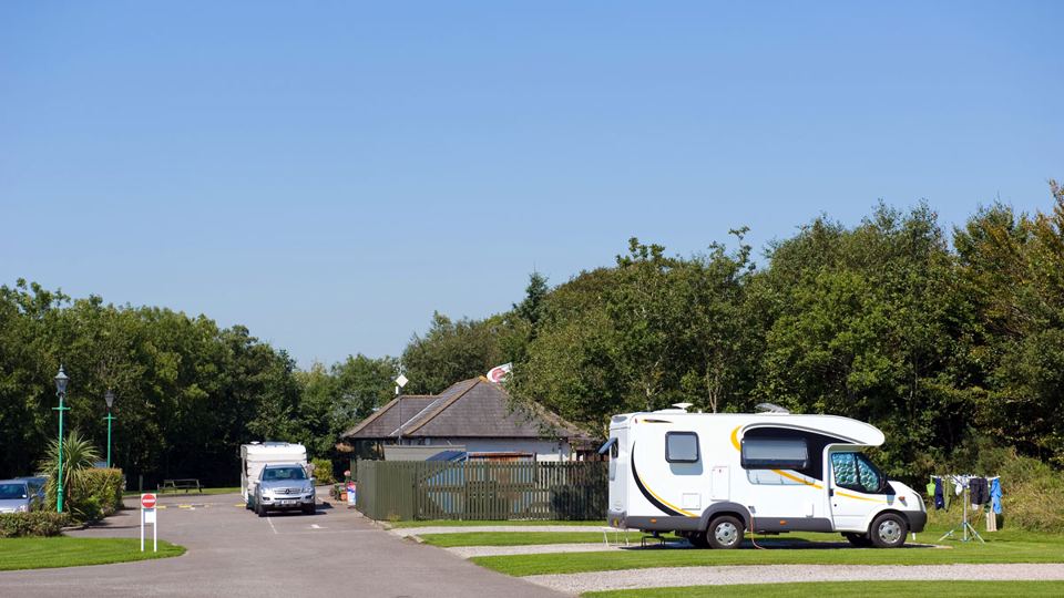 Motorhome beside the hedge