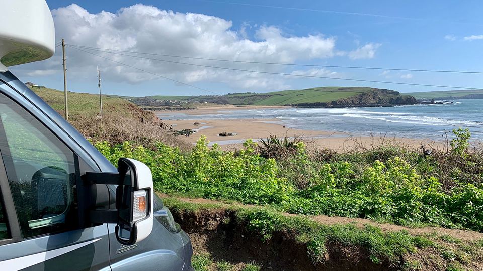 Coastline view past the campervan