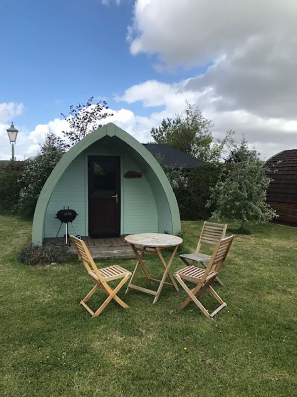 Pod with table and barbecue