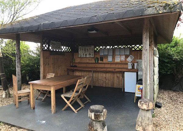Barbecue pavilion with tables
