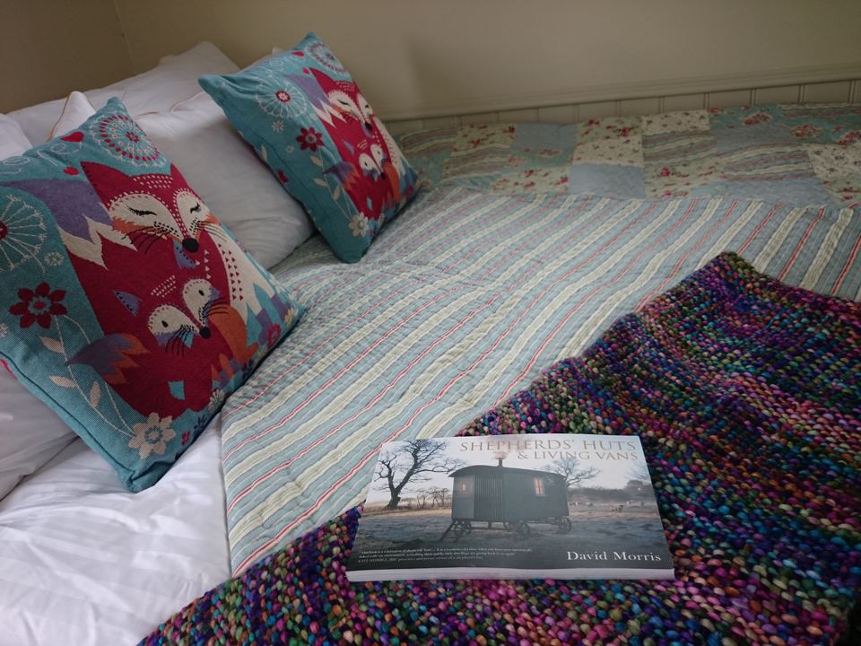 Double bed with throws