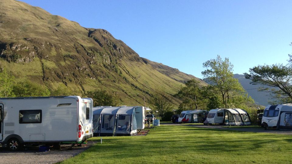 Grass pitches below the hillside