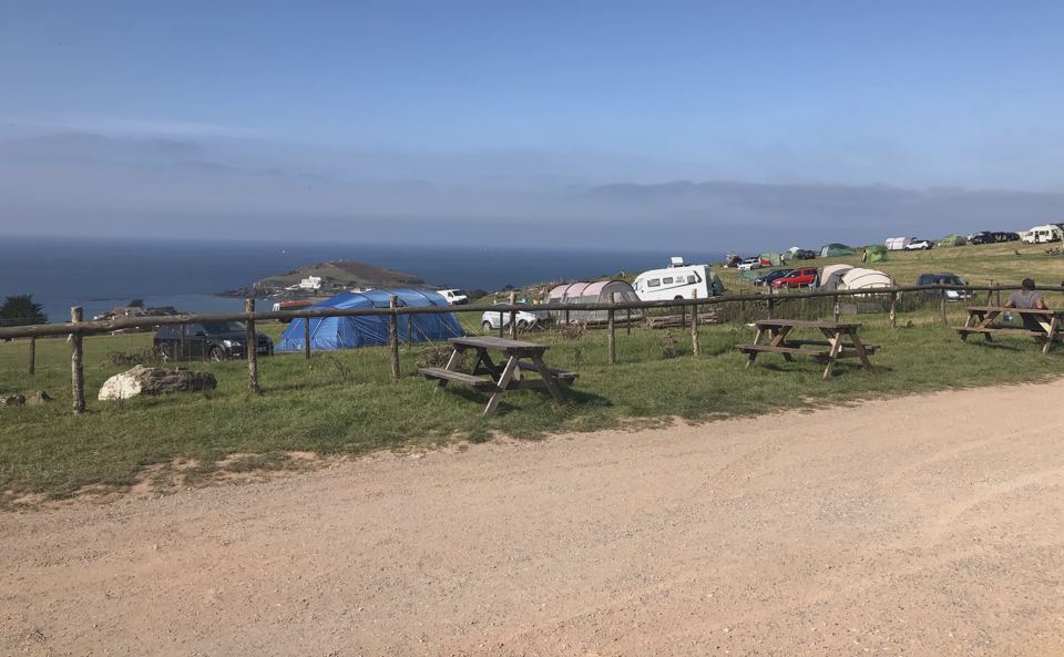 Tent pitches above the sea