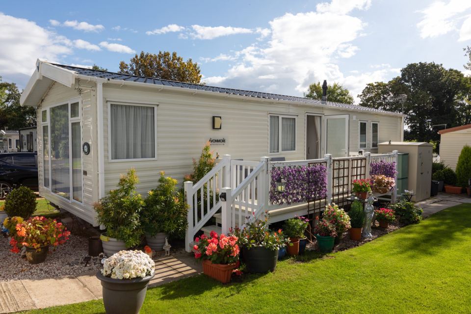 Holiday caravan with flower garden