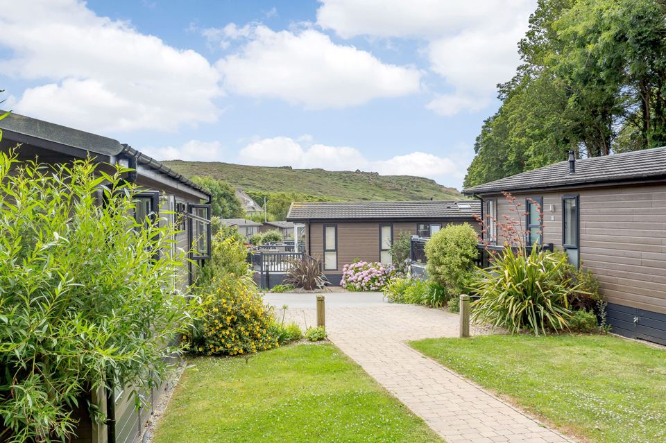 Lodges along a garden path