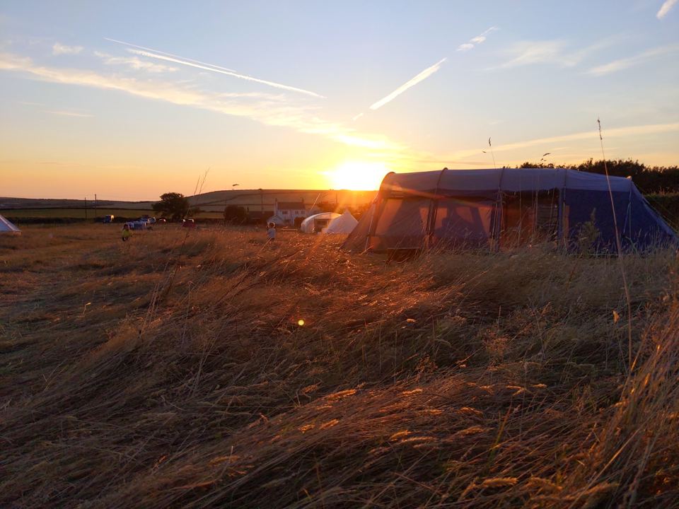 Tent pitched at sunset