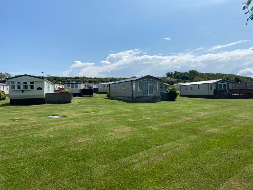 Caravans by the grass