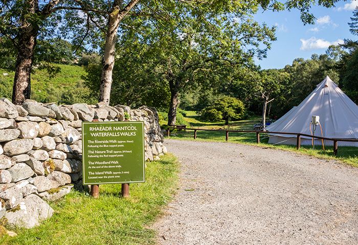 Waterfall walk sign and bell tent